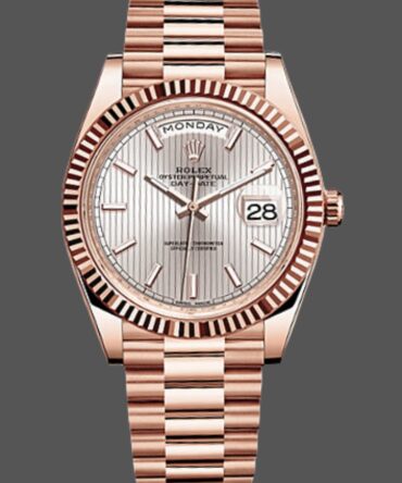 Replica Rolex Day-Date 228235 Sundust Stripe Motif Dial Fluted Bezel 40mm Mens Watch